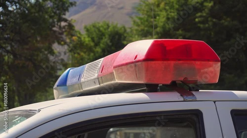 The roof-mounted lightbar of a police car. Close-up shot photo