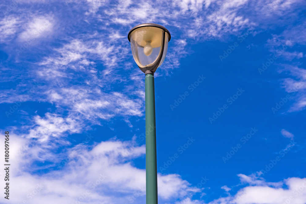 Lamp post  with blue sky and cloudy