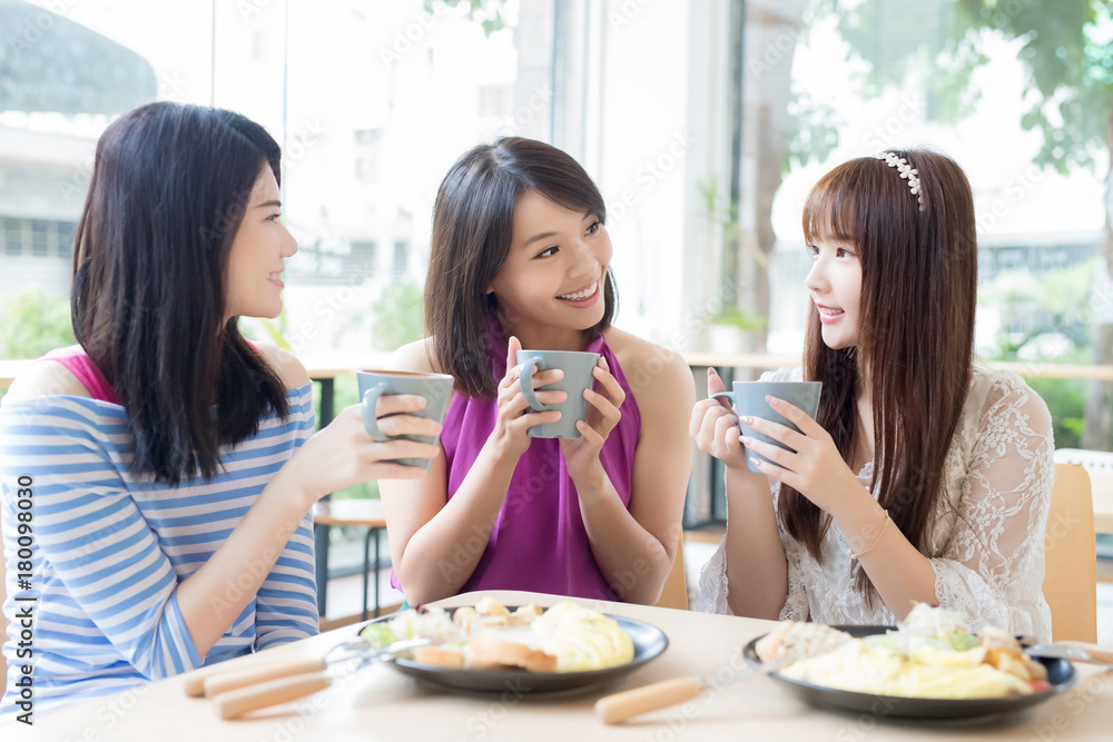 happy woman friends in restaurant happy woman friends in restaurant