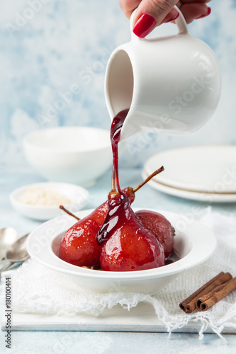 delicious red wine poached pears in spicy syrup