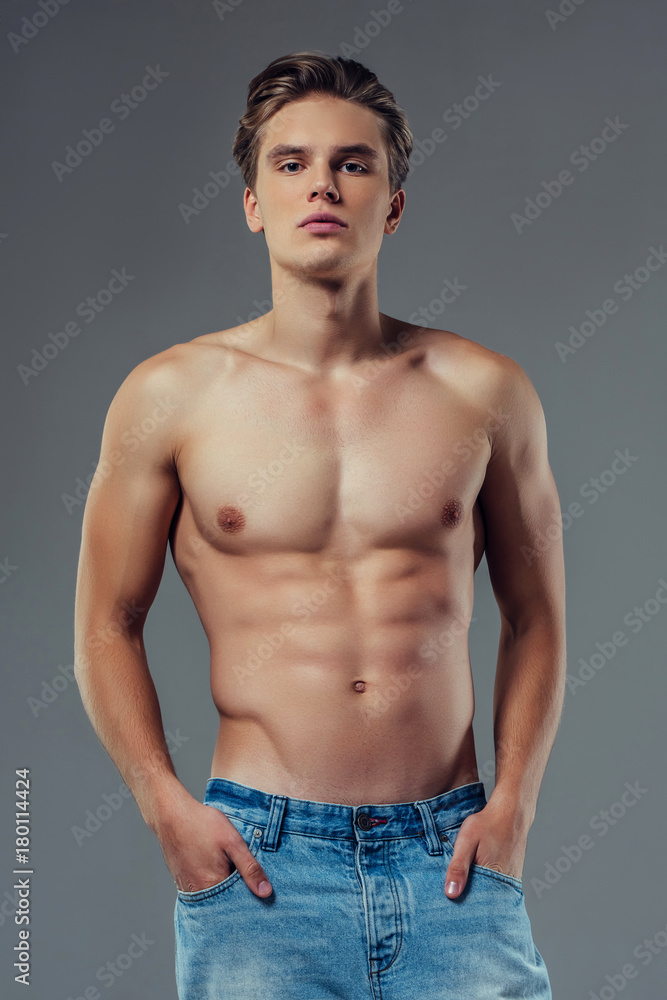 Fototapeta premium Handsome man on grey background