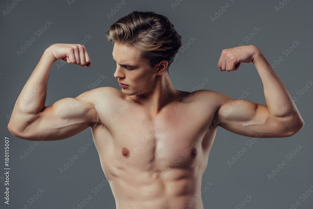 Fototapeta premium Handsome man on grey background