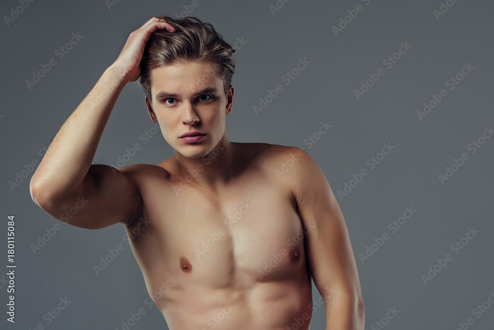 Handsome man on grey background Handsome man on grey background