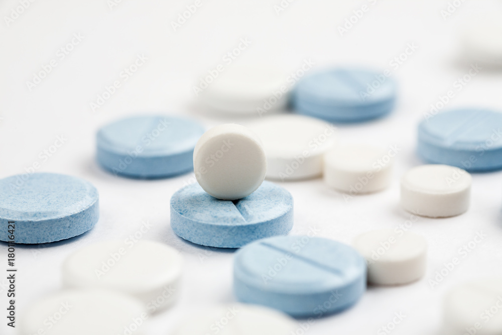 Medications and pills on a white background closeup shot