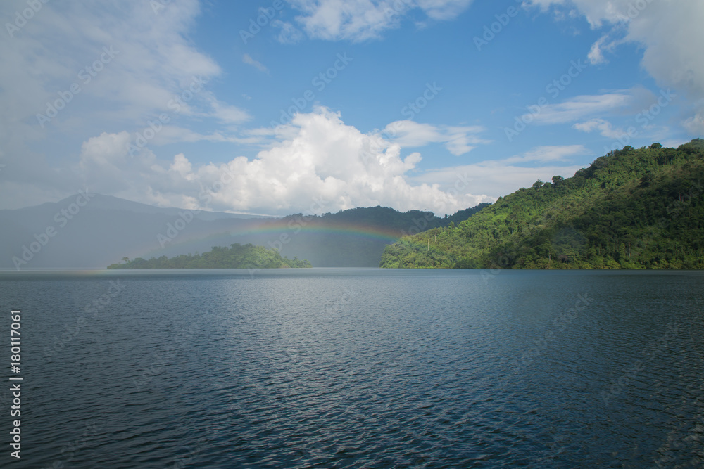 beautiful sky with Rainbow over mountain peak