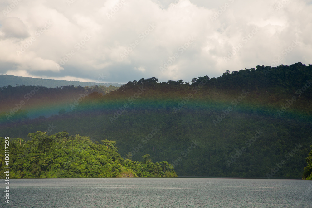 beautiful sky with Rainbow over mountain peak