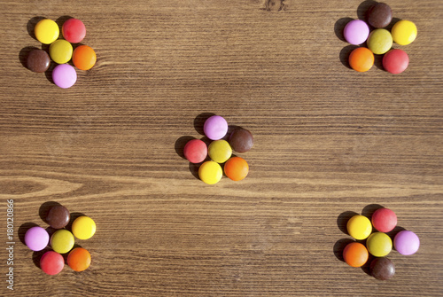 Flower-shaped ofcolorful candies for bacgrounds