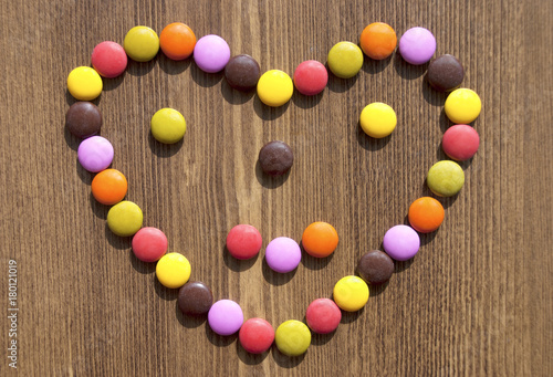 Heart made colorful candies for bacgrounds