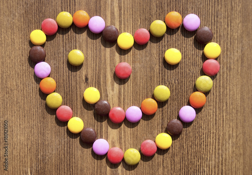 Heart made colorful candies for bacgrounds
