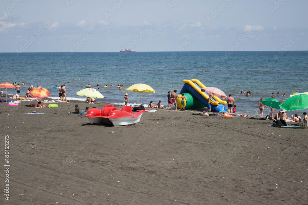 Beach life, holidaymaker at the beach of the image desired blur Beach life, holidaymaker at the beach of the image desired blur