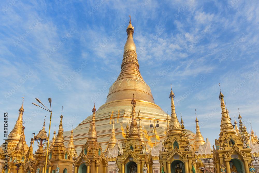 view of  Shwedagon big golden pagoda most sacred Buddhist pagoda in rangoon, Myanmar(Burma) on blue sky background 