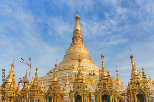 view of  Shwedagon big golden pagoda most sacred Buddhist pagoda in rangoon  Myanmar Burma  on blue sky background 