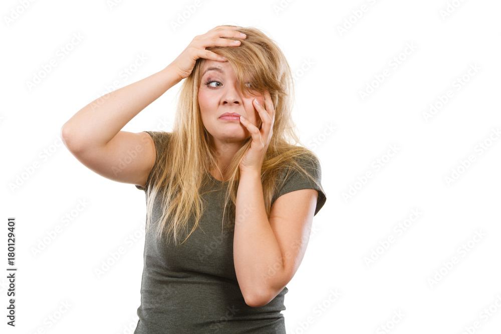 Ashamed embarrassed blonde woman with hands on face Ashamed embarrassed blonde woman with hands on face