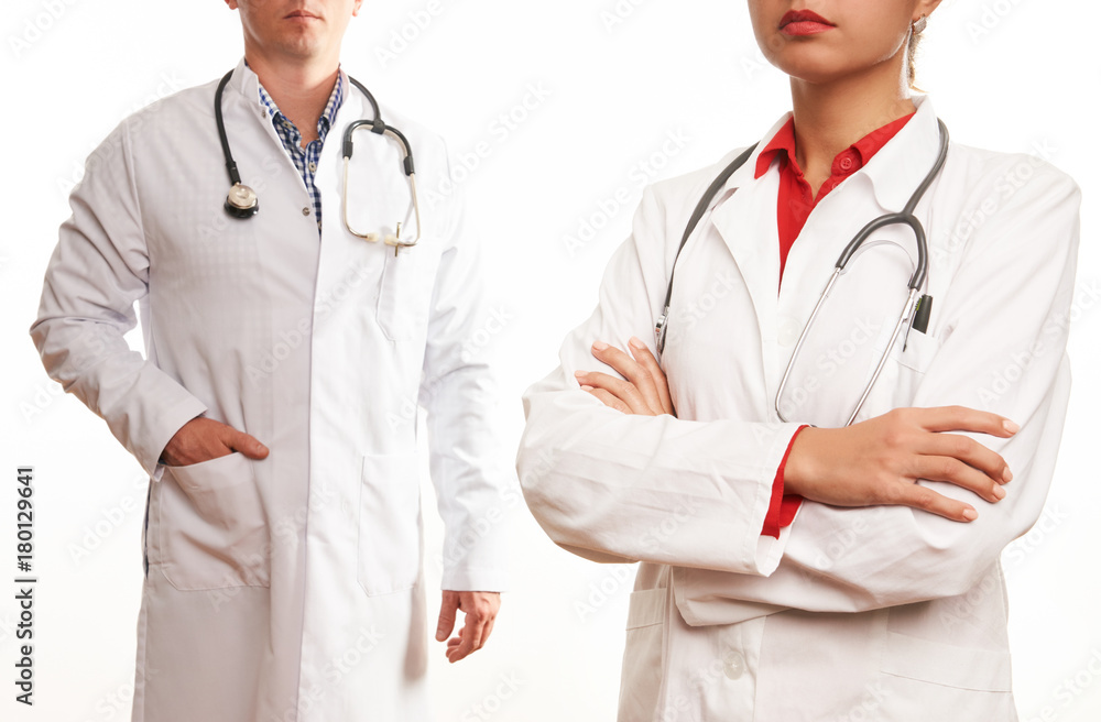 Young team of two doctors, male doctor and female nurse Young team of two doctors, male doctor and female nurse