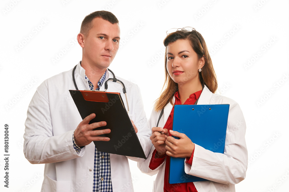 Portrait of two young medical intern people Portrait of two young medical intern people