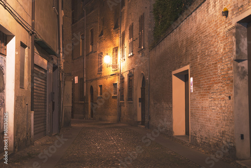 Ferrara, Italy - 22.06.2017: The night streets of the historic Italian city of Ferrara