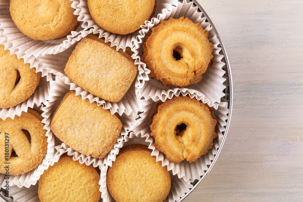 Closeup of Danish butter cookies in tin with copyspace Closeup of Danish butter cookies in tin with copyspace