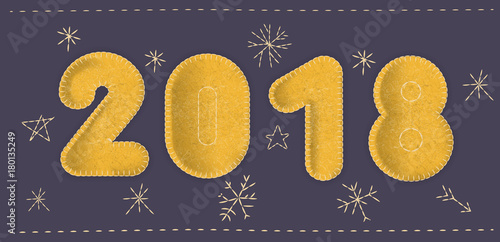 Vector "2018" concept. Number made of yellow felt fabric on a dark blue background with embroidered snowflakes. For cute New Year design.