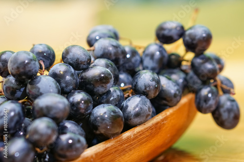 Wallpaper Mural Grapes on wood table Torontodigital.ca
