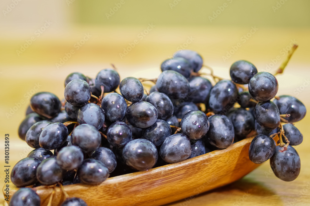 Grapes on wood table Grapes on wood table
