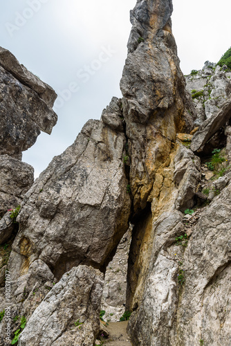 Iron stairs and hiking path to Ellmauer Halt at Wilder Kaiser mountains of Austria - close to Gruttenhuette, Going, Tyrol, Austria - Hiking in the Alps of Europe