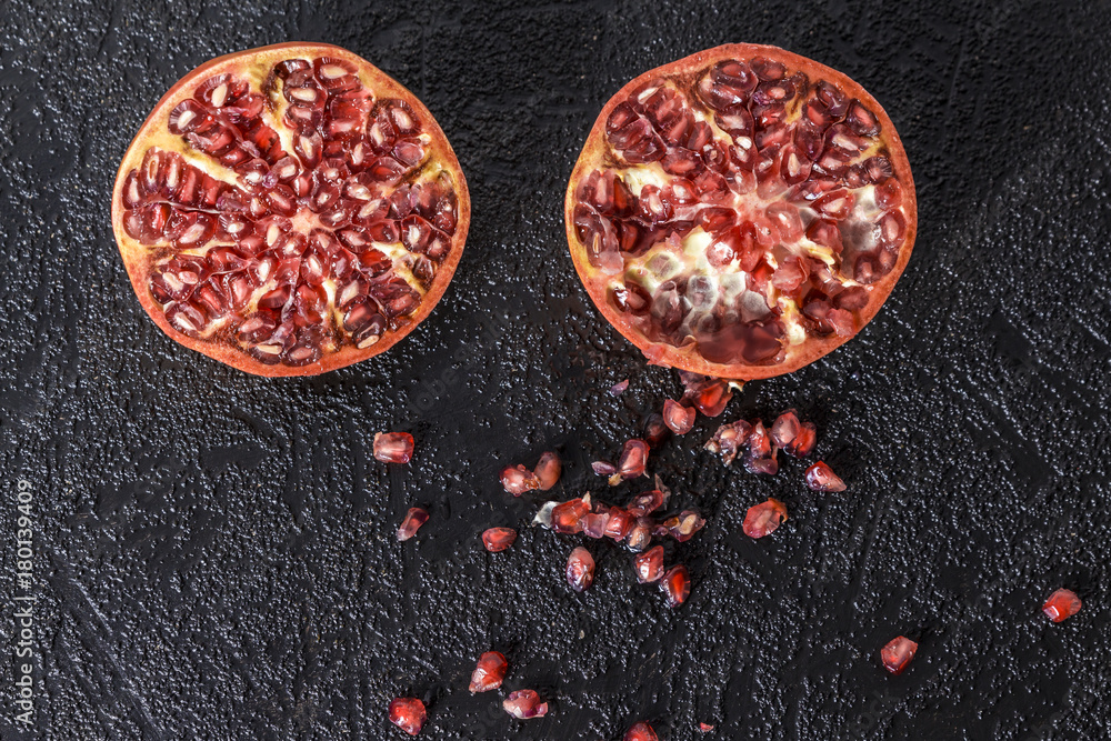 Pomegranate in a black background Pomegranate in a black background