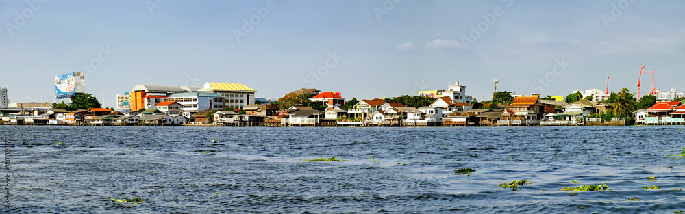 Cityscape with old traditional building near the Chao Phraya River in Bangkok, Thailand.