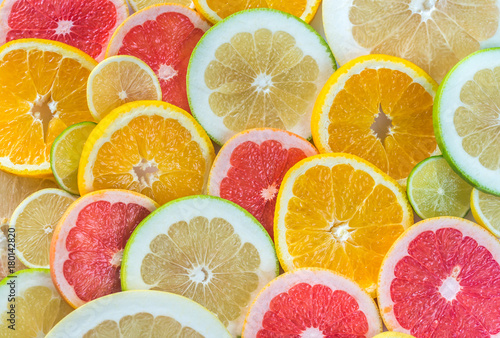 Slices of citrus fruits: top view