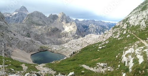 Alpine panorama in Triglav National Park with Zgornje Kriško jezero. photo