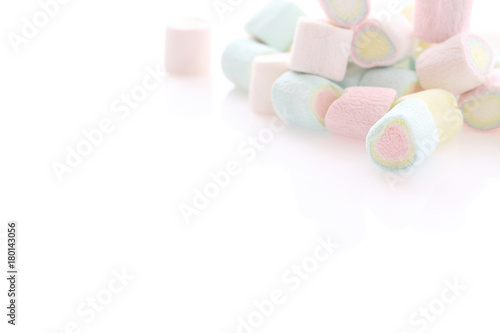 Pastel colourful marshmallows isolated in white background