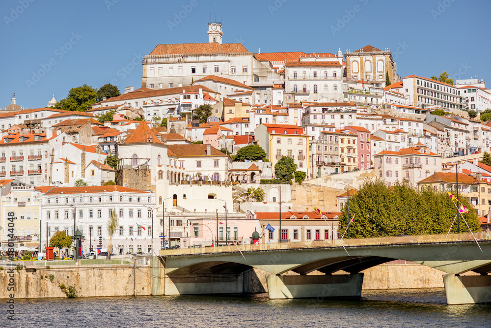 Cityscape view on the old town of Coimbra city during the sunny day in the central Portugal