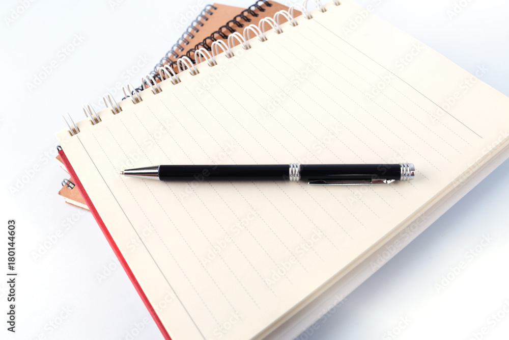 Open book with blank pages and pen on white background Open book with blank pages and pen on white background