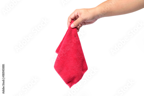 A man's hand is holding a red rag on white background or isolated