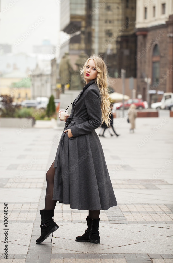 Portrait of a young beautiful woman in gray coat Portrait of a young beautiful woman in gray coat