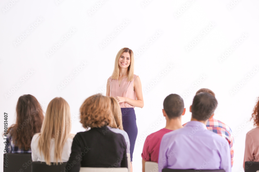 Group of people with business trainer at seminar Group of people with business trainer at seminar