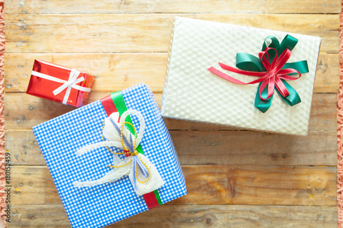 Christmas gift box on wooden background. Merry Christmas and Happy New Year!! Top view.