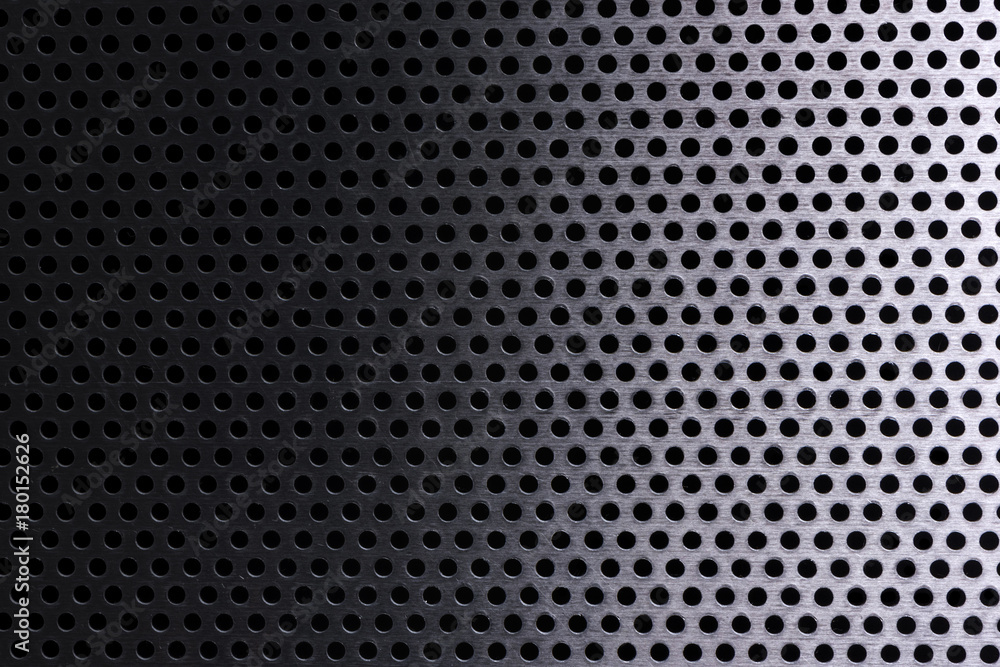 Metallic object, dotted background texture Metallic object, dotted background texture