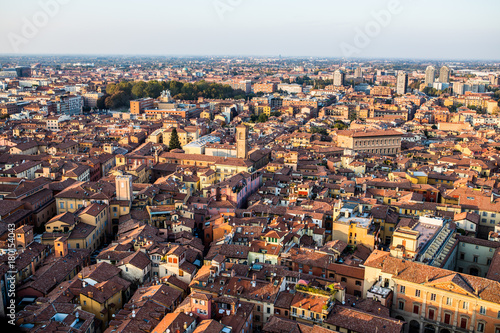 Aerial view of Bologna, Italy at sunset. Colorful sky over the historical city center and old buildings
