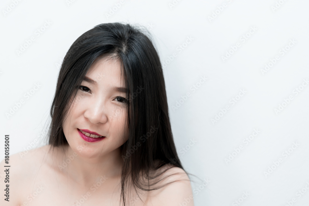 Young asian beautiful woman clean skin on white background,healthy face skin concept
