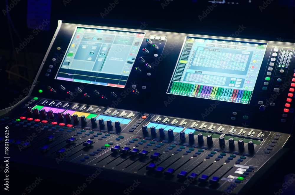 Board mixing console. Mixer. The sound engineer's console. Sound engineer's fingers are pressing the button audio controller.work place sound engineer's. Board mixing console. Mixer. The sound engineer's console. Sound engineer's fingers are pressing the button audio controller.work place sound engineer's.