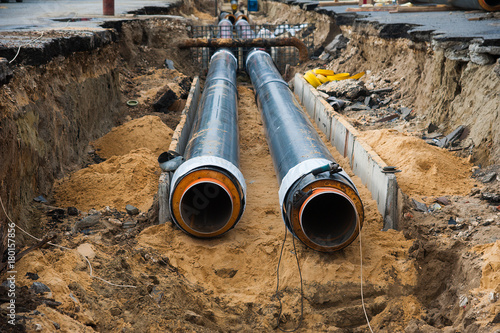 Laying new pipes in the trench