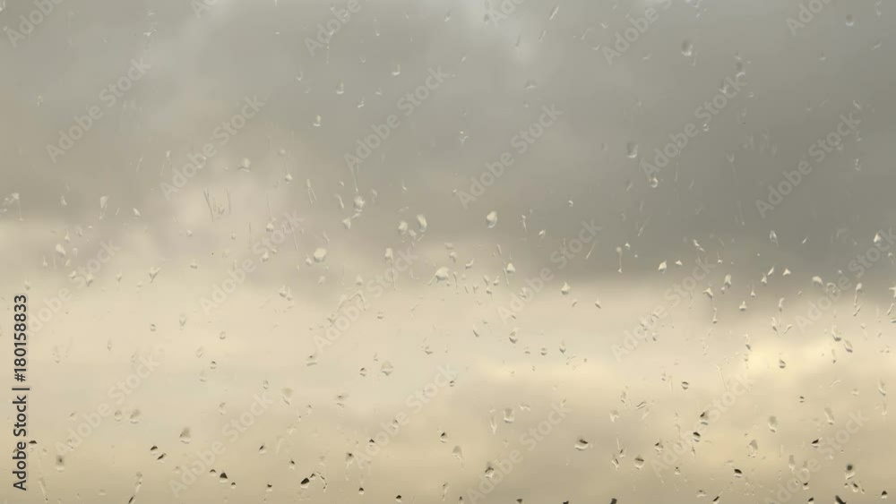 time lapse clouds, rain drops on glass time lapse clouds, rain drops on glass