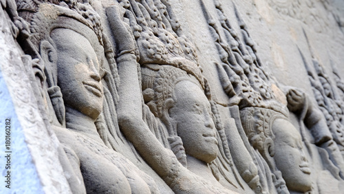 Apsara girls on the wall of Angkor Wat with shade of light, Siem Reap, Cambodia