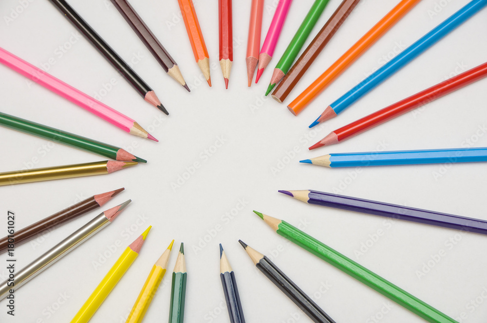 
many multicolored pencils on white background