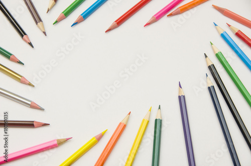  many multicolored pencils on white background
