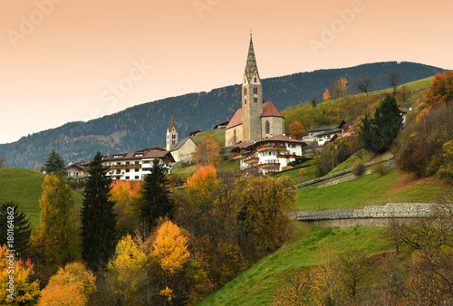 The Church of Villandro in Autumn season. Bolzano, Italy.