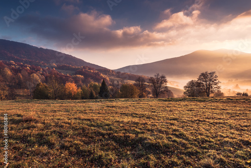Fototapeta Naklejka Na Ścianę i Meble -  Sunrise at misty foggy morning in Bieszczady Carpathian Mountains in Poland