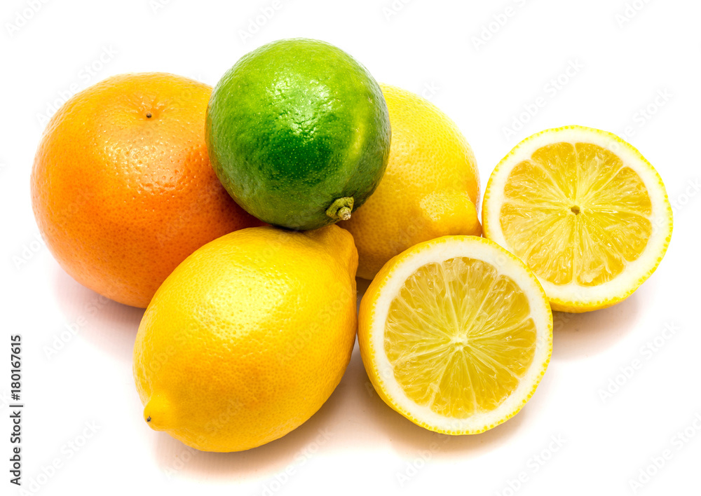 Citrus. Two whole limes, lemons and its halves isolated on white background.