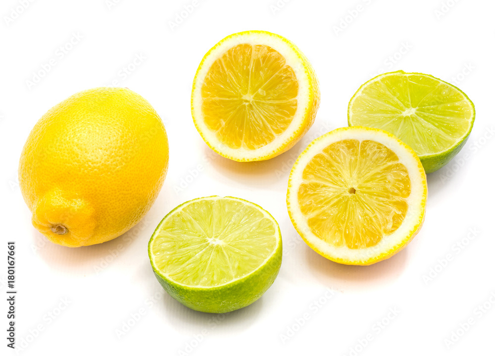 One whole lemon, two lemon and lime halves isolated on white background.