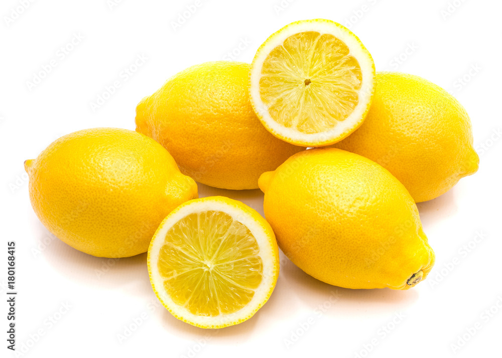 Group of whole yellow lemons and two halves isolated on white background. Group of whole yellow lemons and two halves isolated on white background.